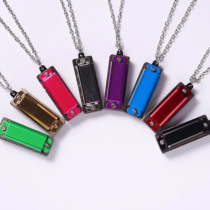 Mini collar de armónica person - Musical Instrument Logo reseña y precio